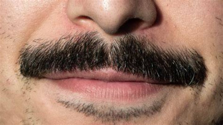 Meet The Woman Behind The Mustache