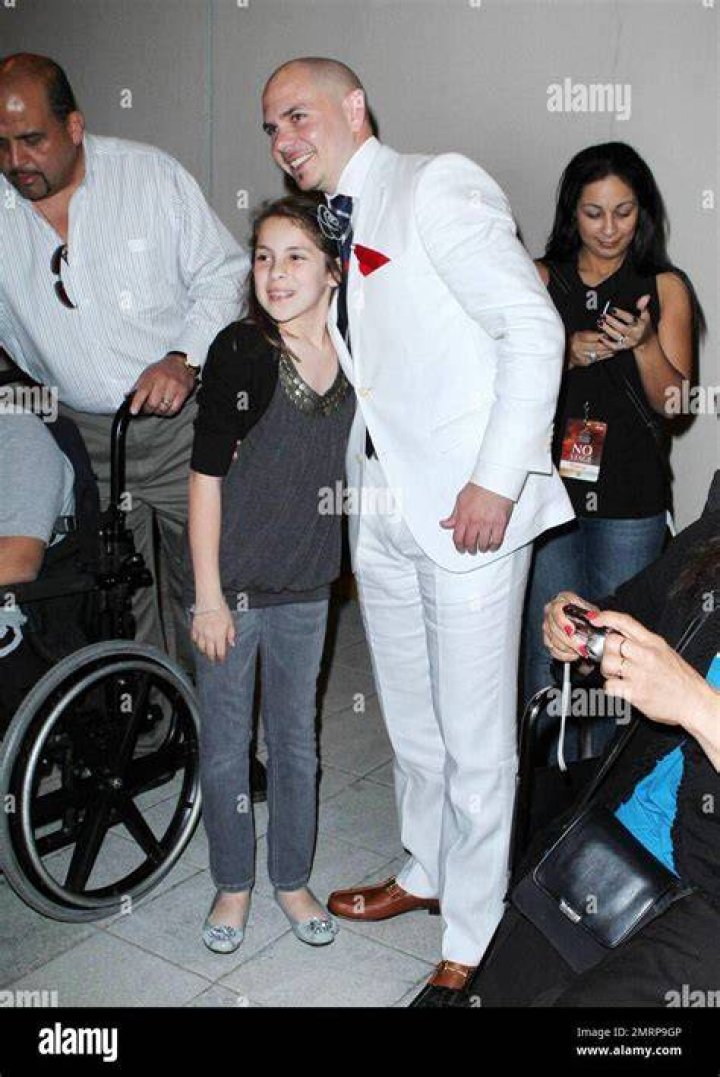 The Unveiling: Singer Pitbull's Wife Revealed