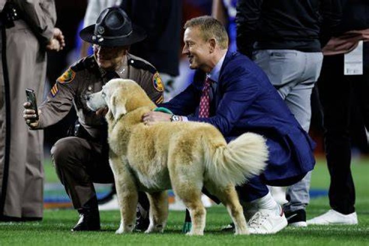 Why Does Kirk Herbstreit Travel With His Beloved Canine Companion?